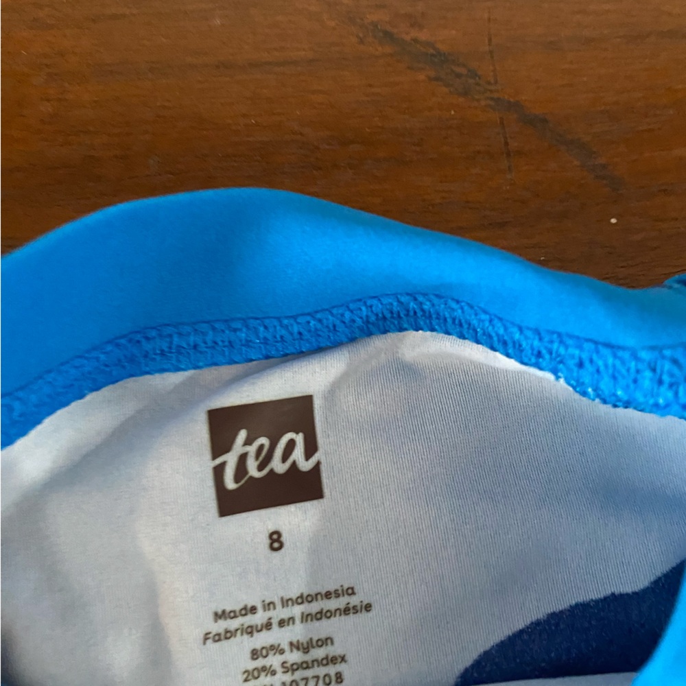 Tea Collection Blue Dolphin Print Kids Swim Rashguard - Picture 2 of 2
